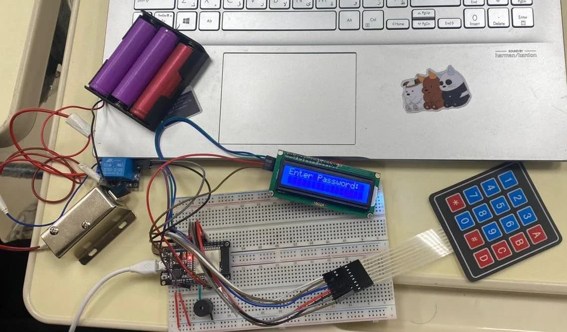 The prototype on a breadboard: ESP32, relay, solenoid lock, LCD, keypad and battery pack